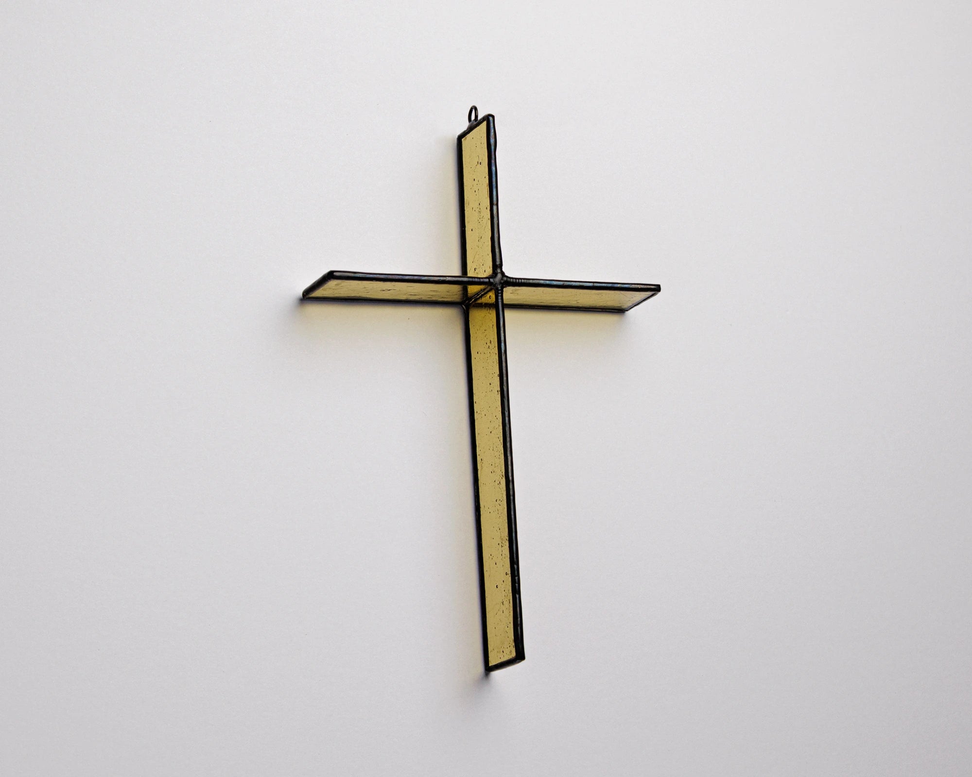 Summer Gold cross, patina solder finish in soft light